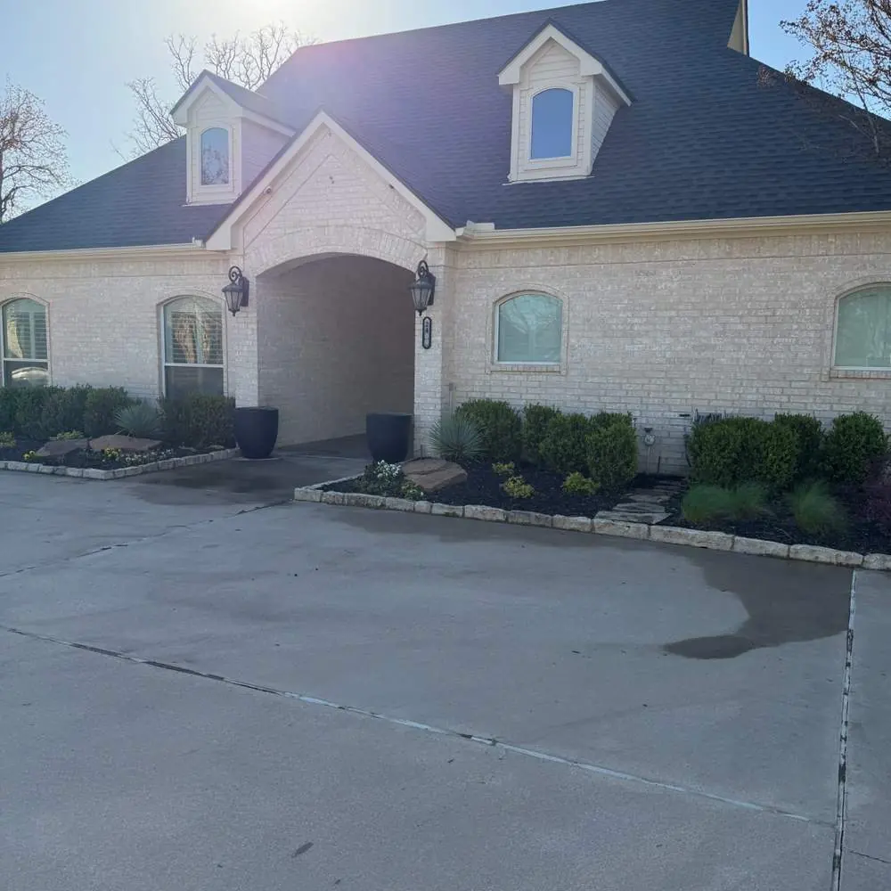 Whole home exterior and driveway refreshed by pressure washing