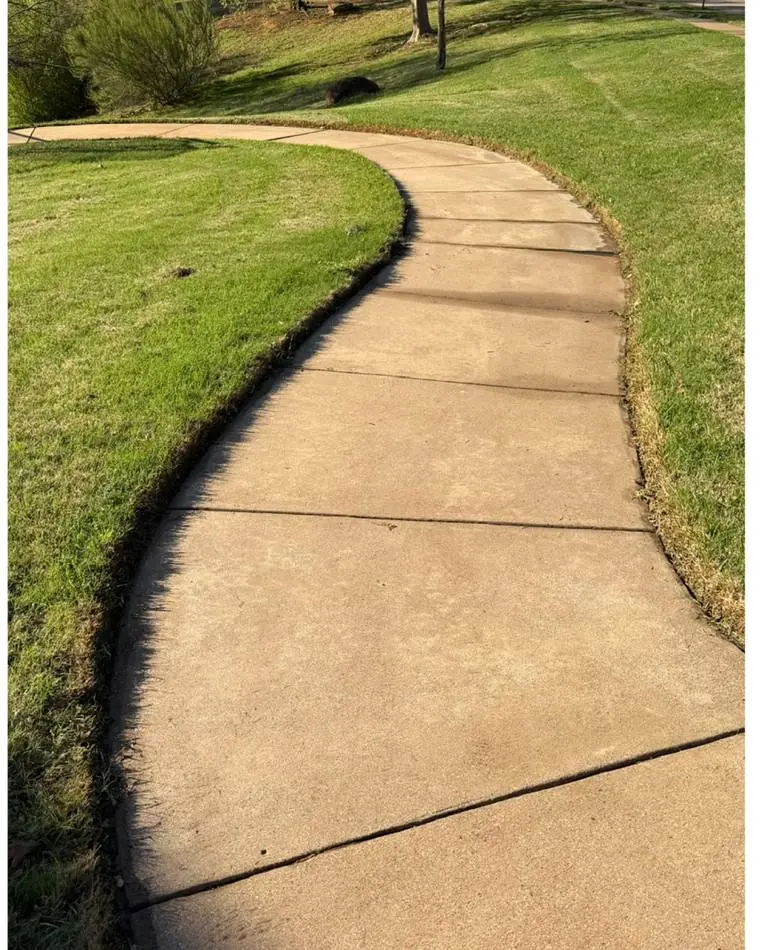Clean concrete walkway after pressure washing in the DFW area