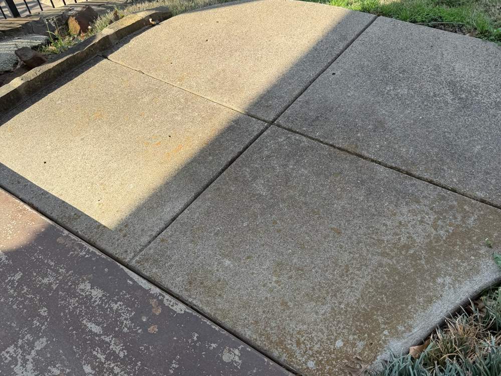 Concrete walkway pressure washed clean